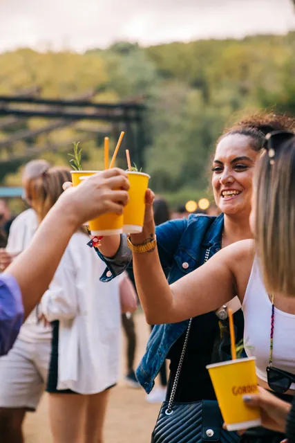 Guests raising yellow cups