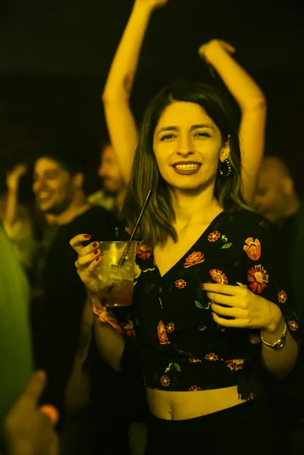 A smiling guest in the crowd