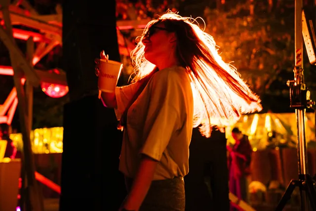 Dancing and hair catching the warm light