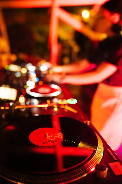 A detail of a record playing on the turntable