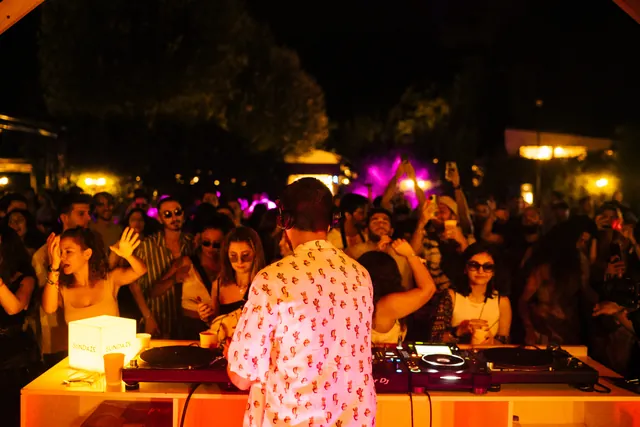 The crowd from behind the booth during a later set